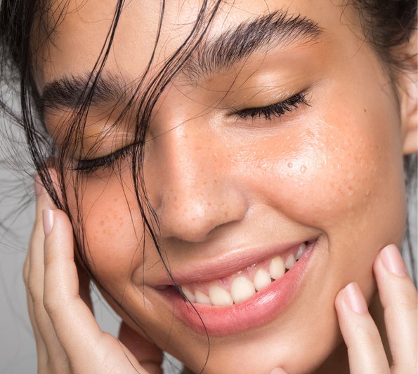 cosmetic webinar - Supercharge your skin, smiling woman looking down