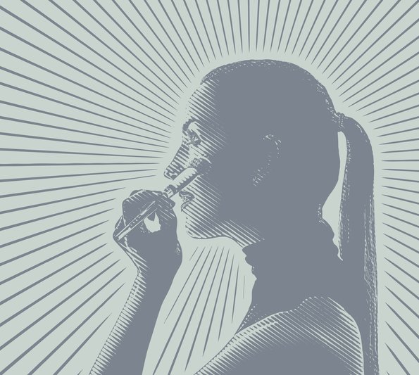 rahn cosmetics - side profile of a young woman with a ponytail putting make up on